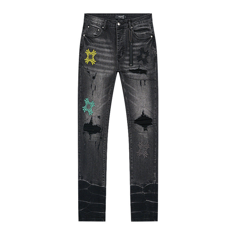 Black and grey water-washed cross-stitch hole-cut slim-fit jeans