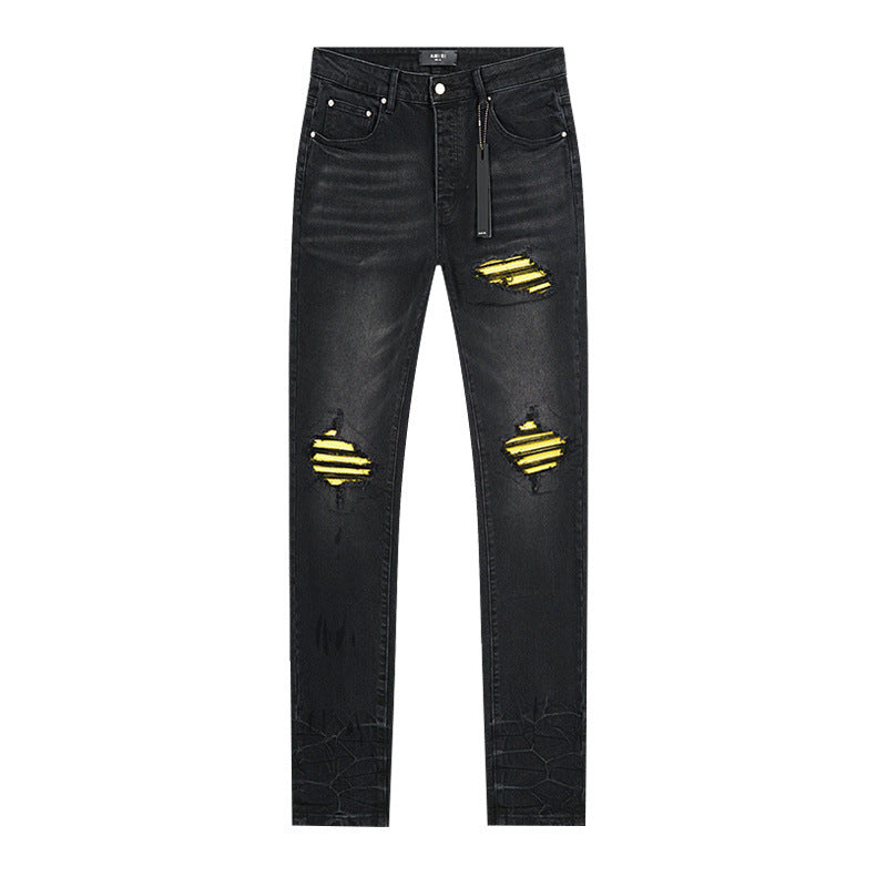 High street tailored distressed jeans