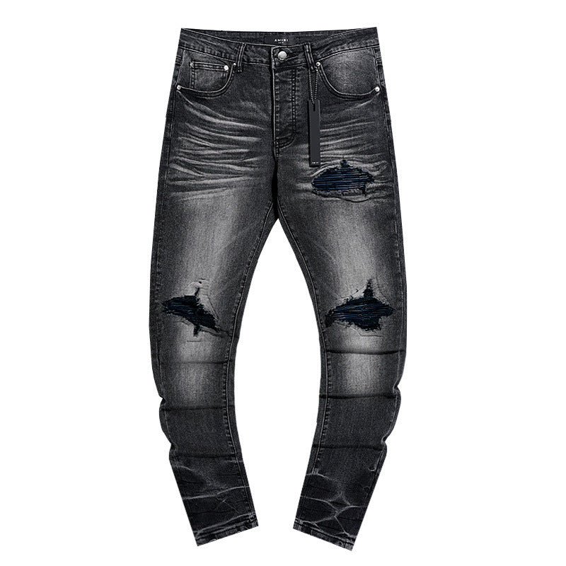 Black and grey water-washed holey fitted stretch denim pants