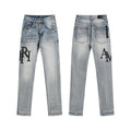 Men's Luxury Light Blue Stacked Denim with Black Chenille Patch Logo