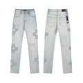 Men's Luxury Light Blue Distressed Denim with Frayed Radial Star Appliques