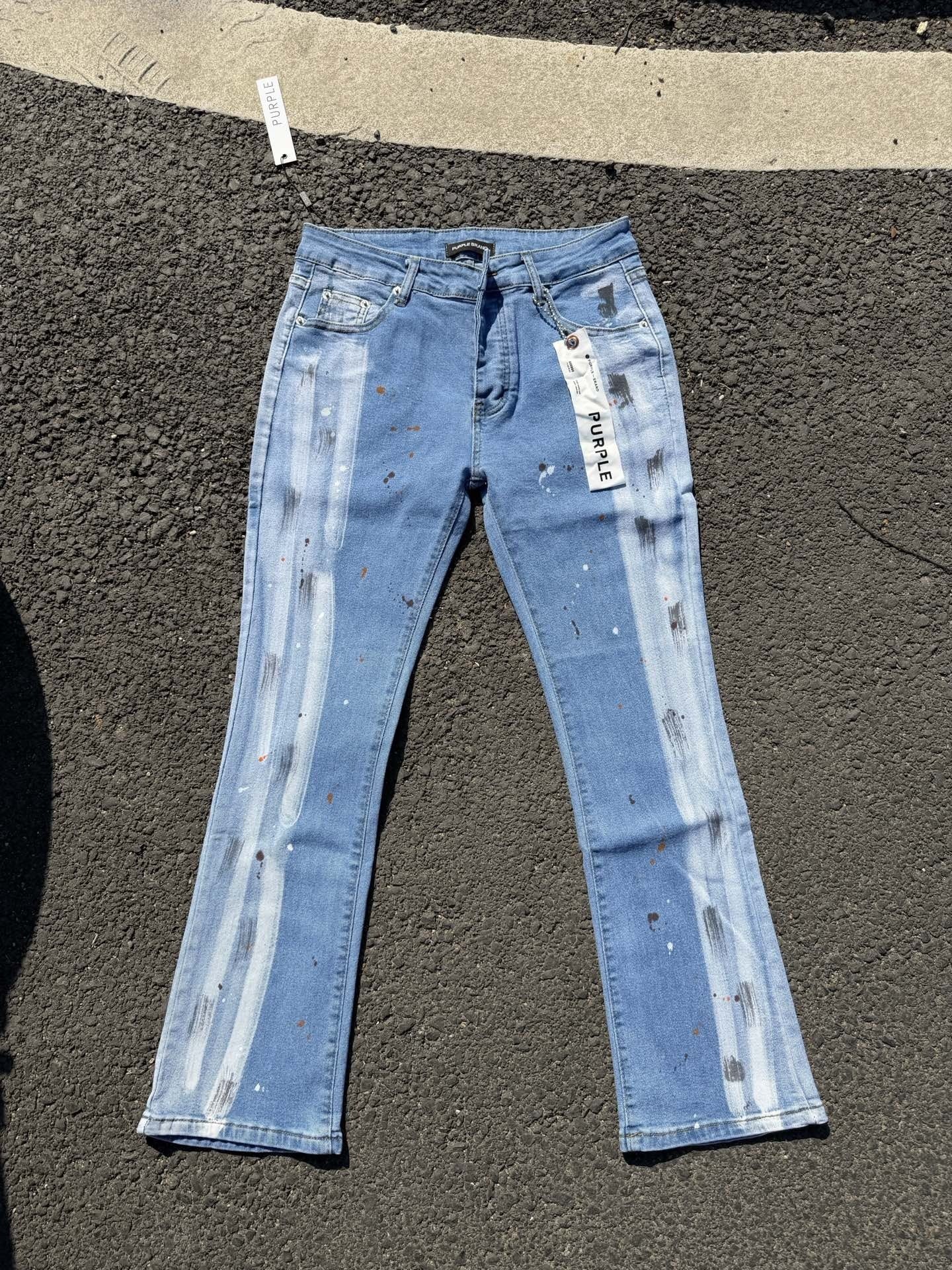 Luxury Mid-Blue Bootcut Denim with Hand-Brushed Black Paint Strips