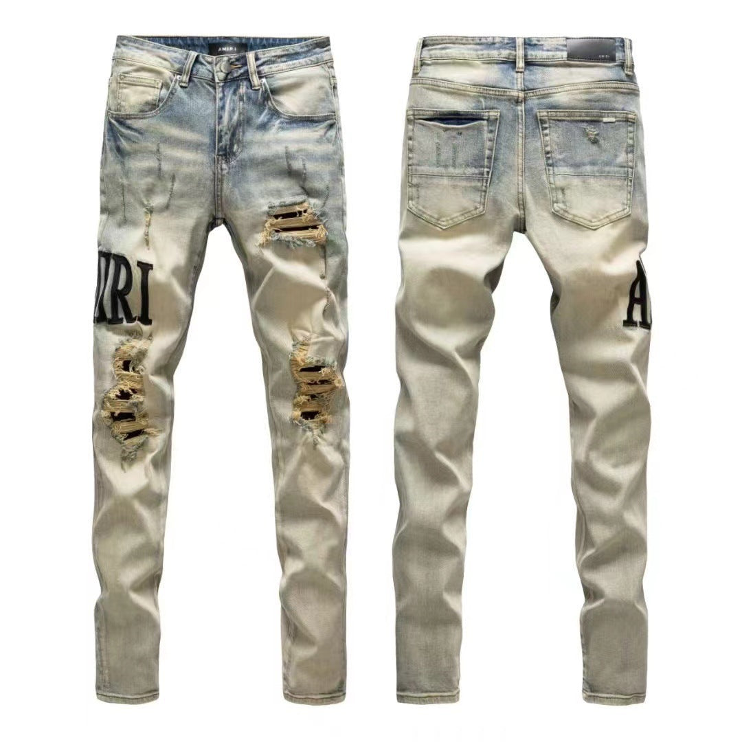 Luxury Wasteland Mid-Blue Destroyed Denim with Pitch Black Leather Letter Applique