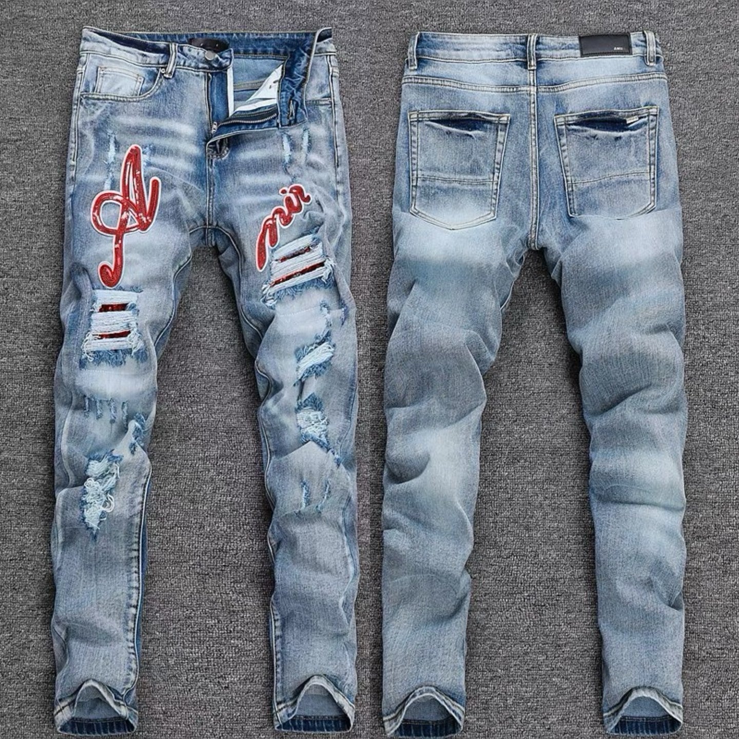 Luxury West-Coast Indigo Denim with Cursive Script AMIRI Logo Applique